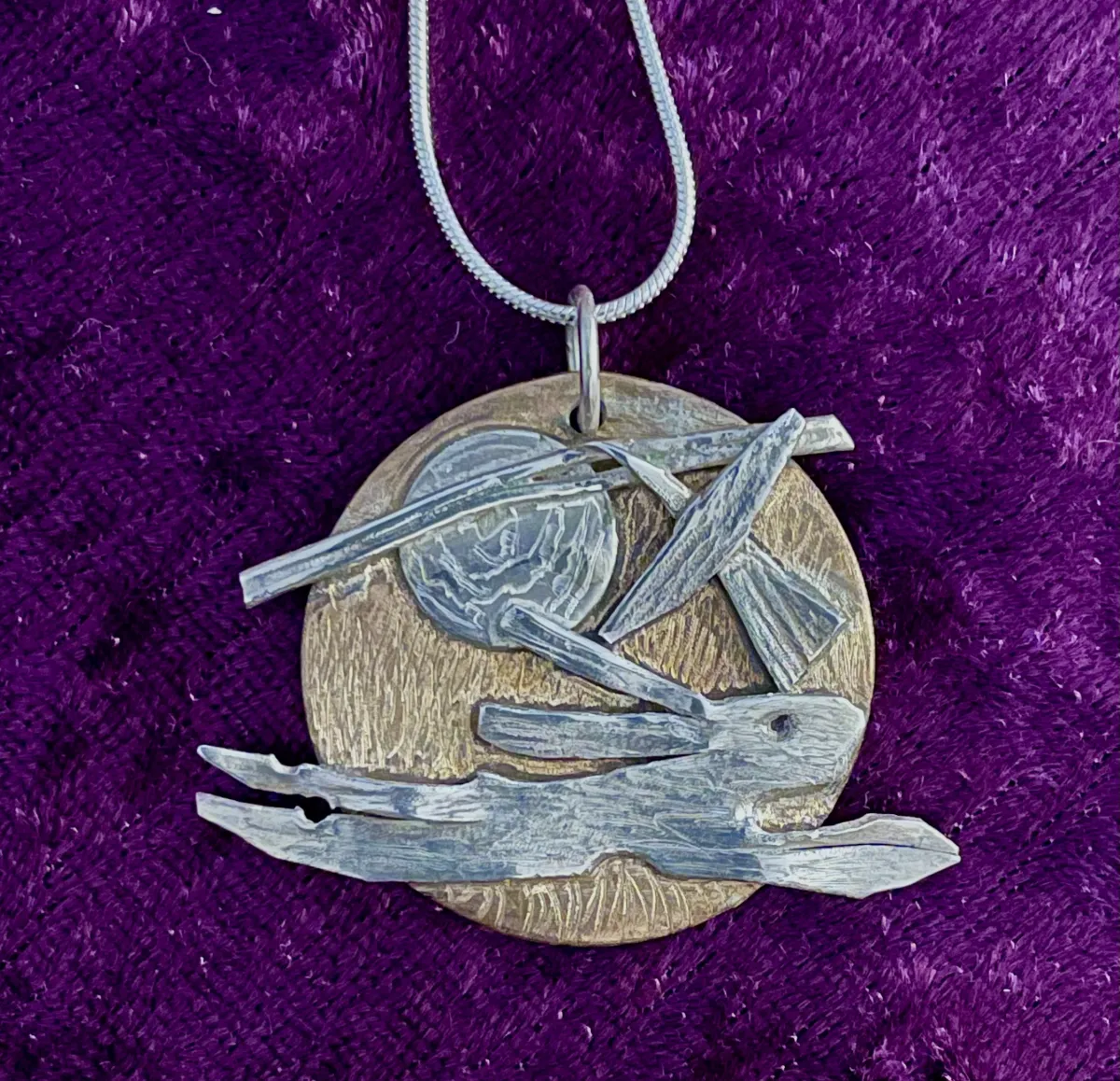 Silver hare and bird pendant