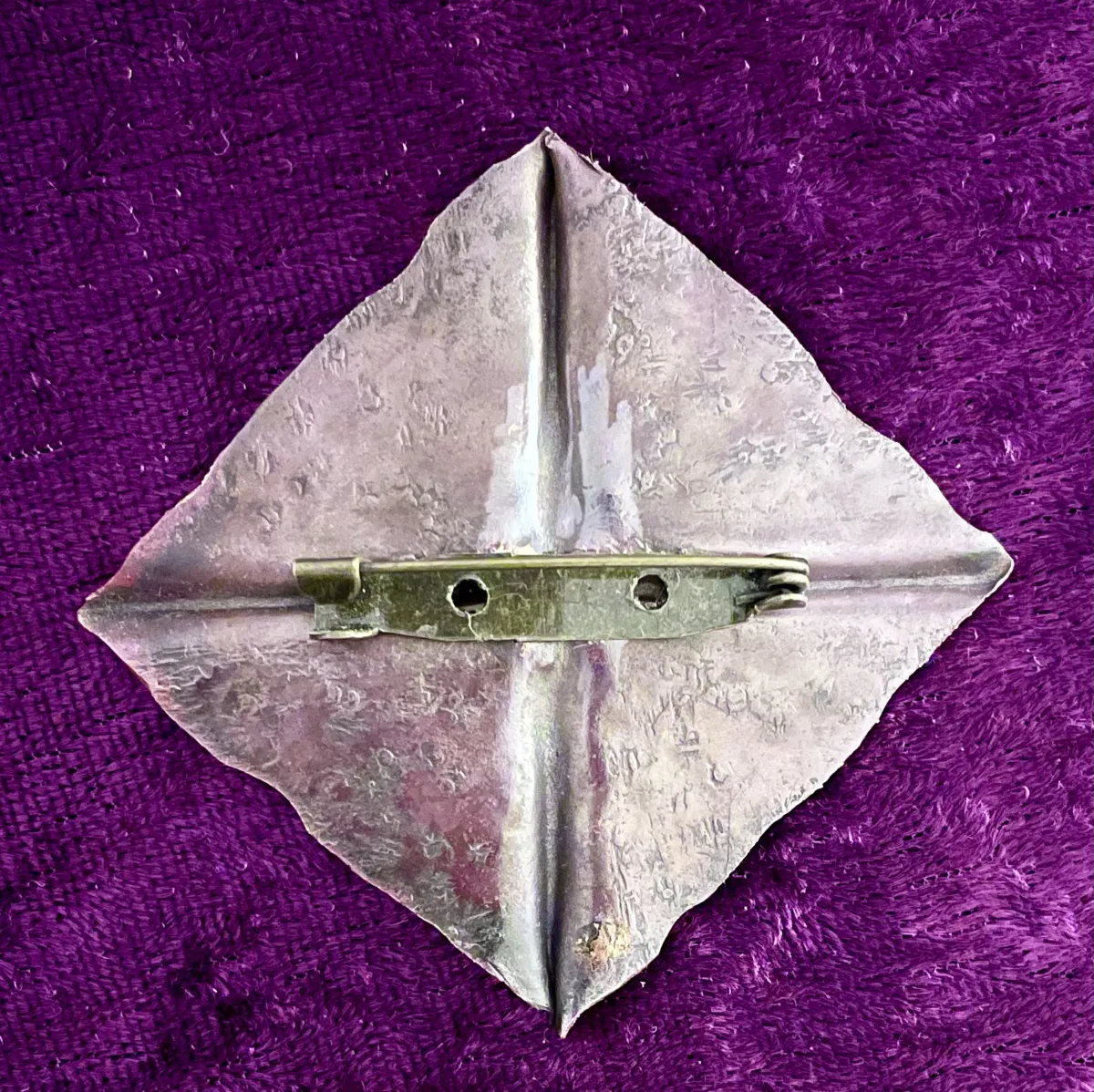 Copper and silver brooch