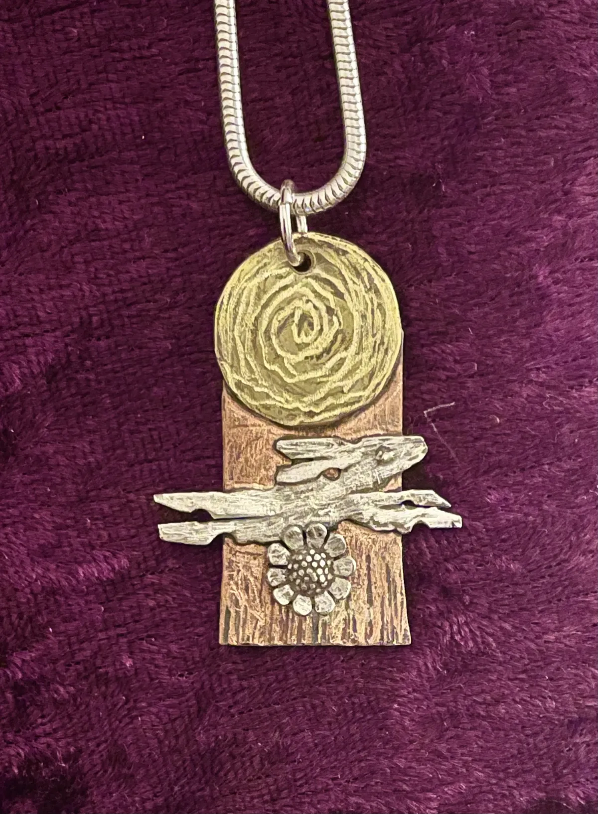 Silver running hare on copper