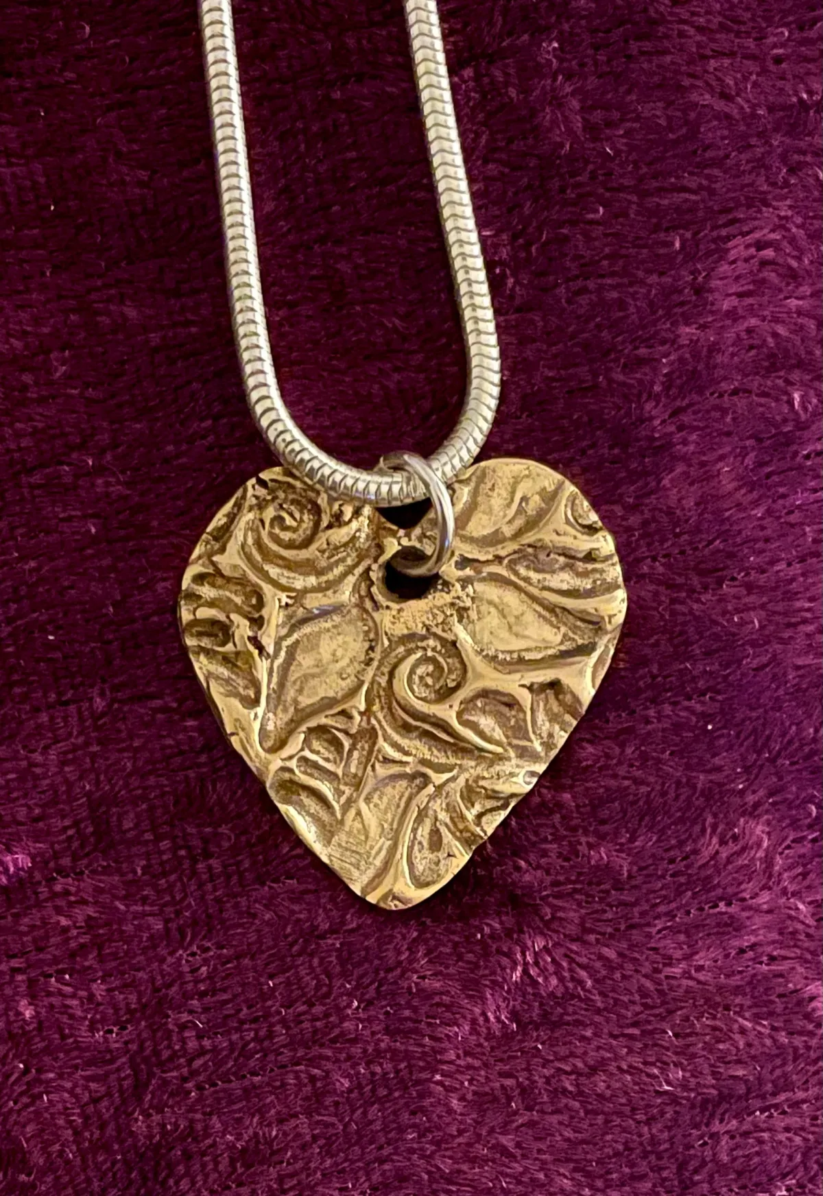 Textured bronze heart pendant