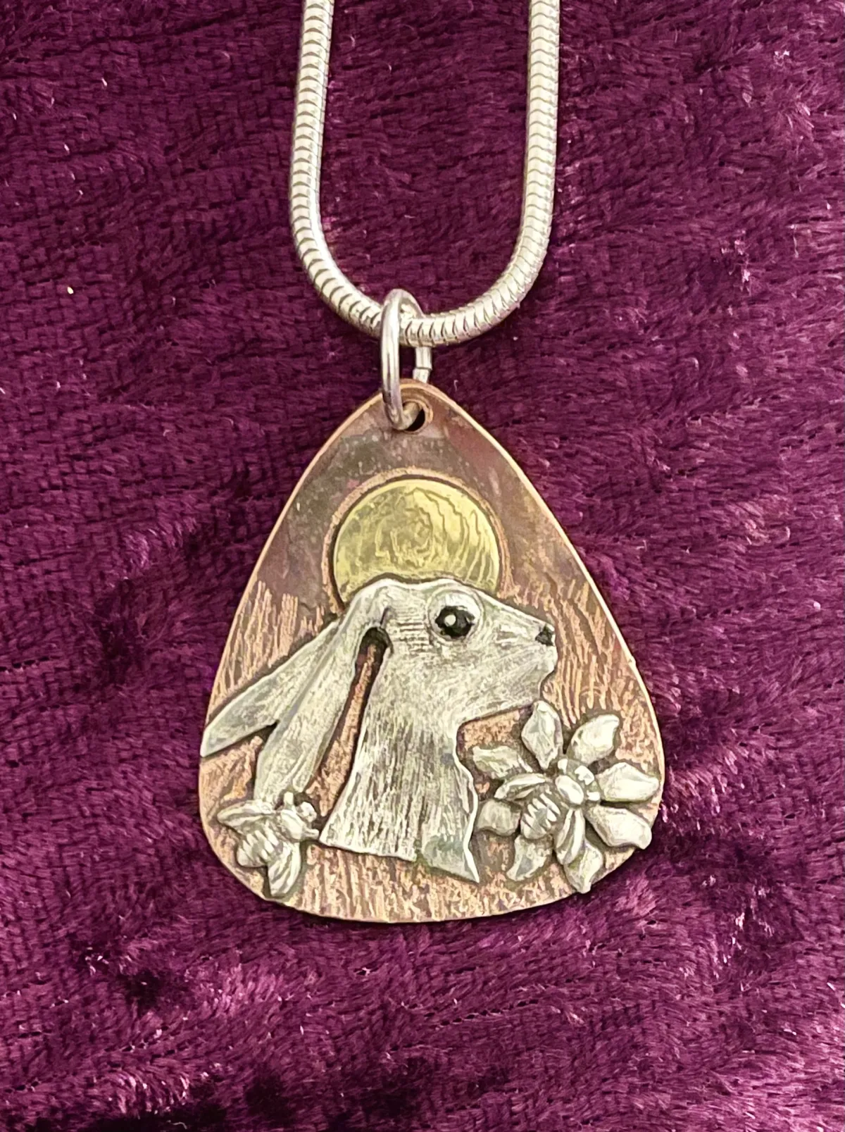 Silver hare on copper