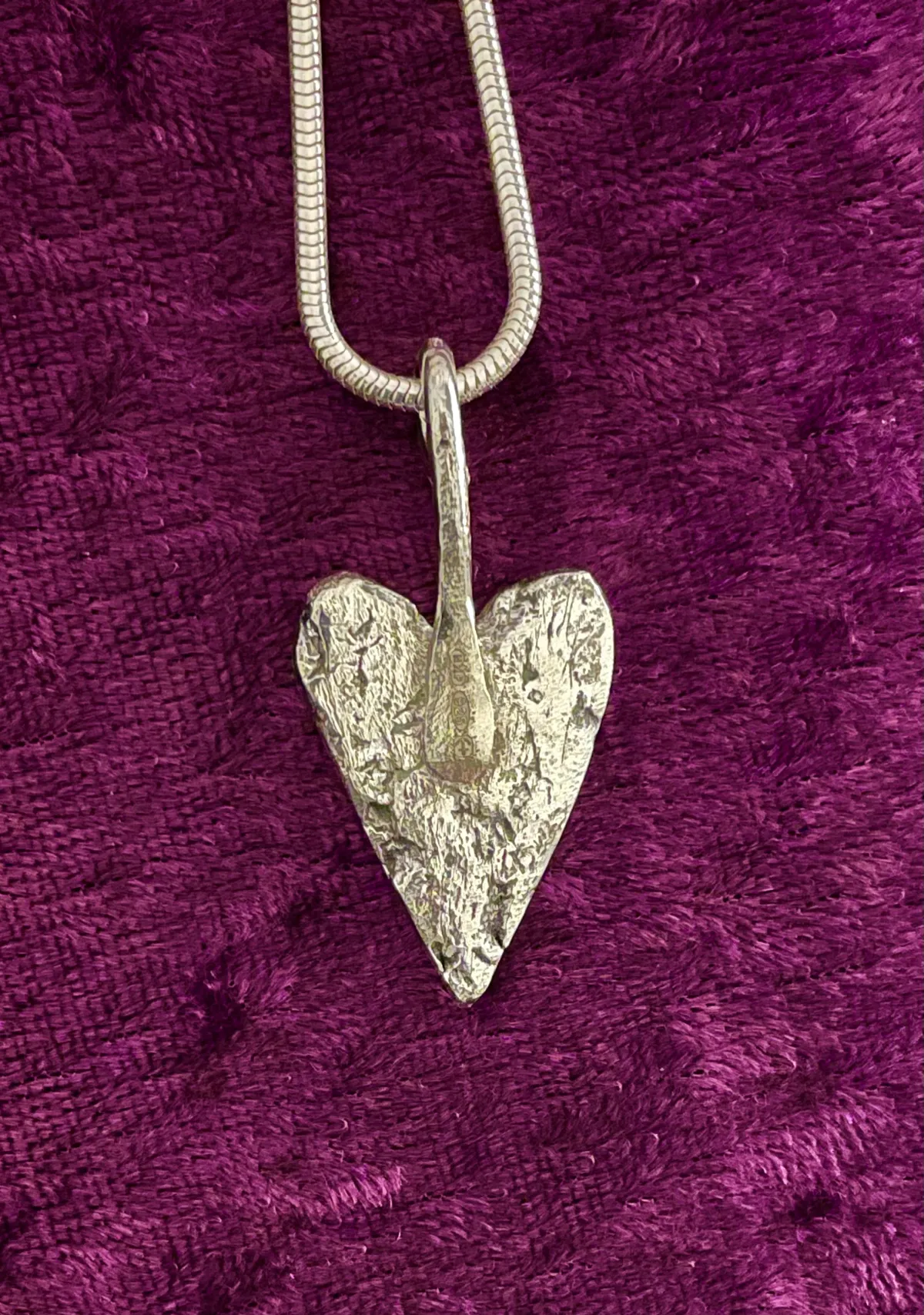 Forged silver heart shaped pendant