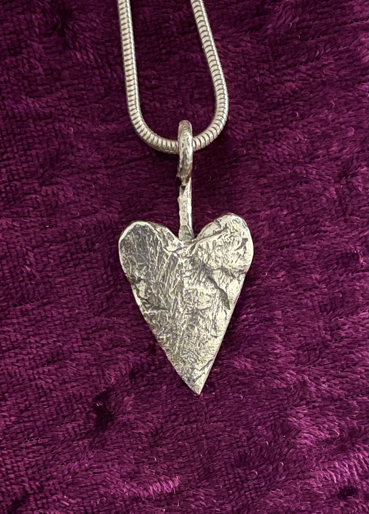 Forged silver heart shaped pendant