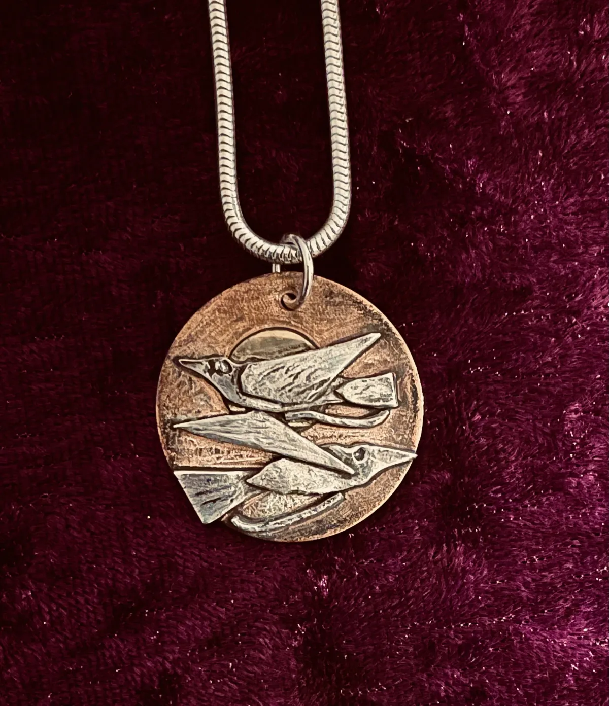 Silver birds pendant