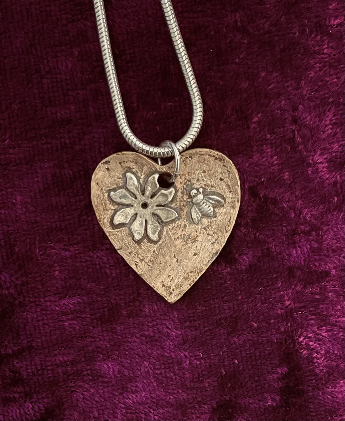 Textured bronze heart pendant
