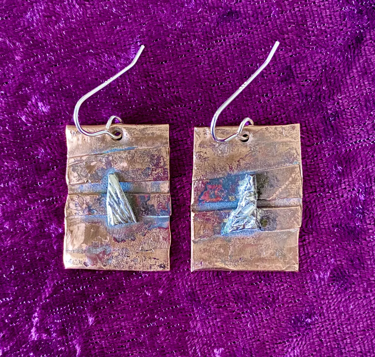 Copper and silver textured earrings