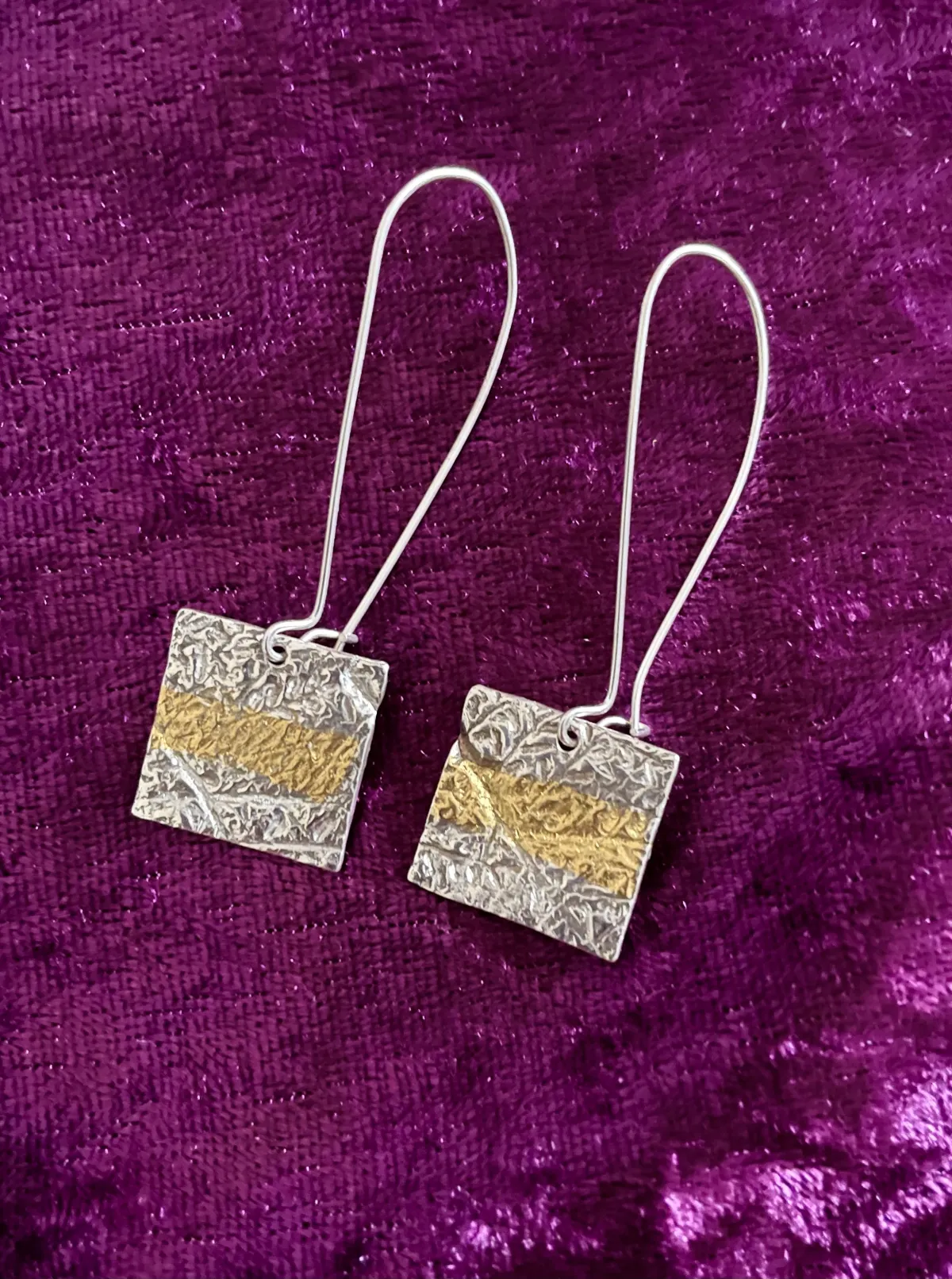 Silver and gold earrings