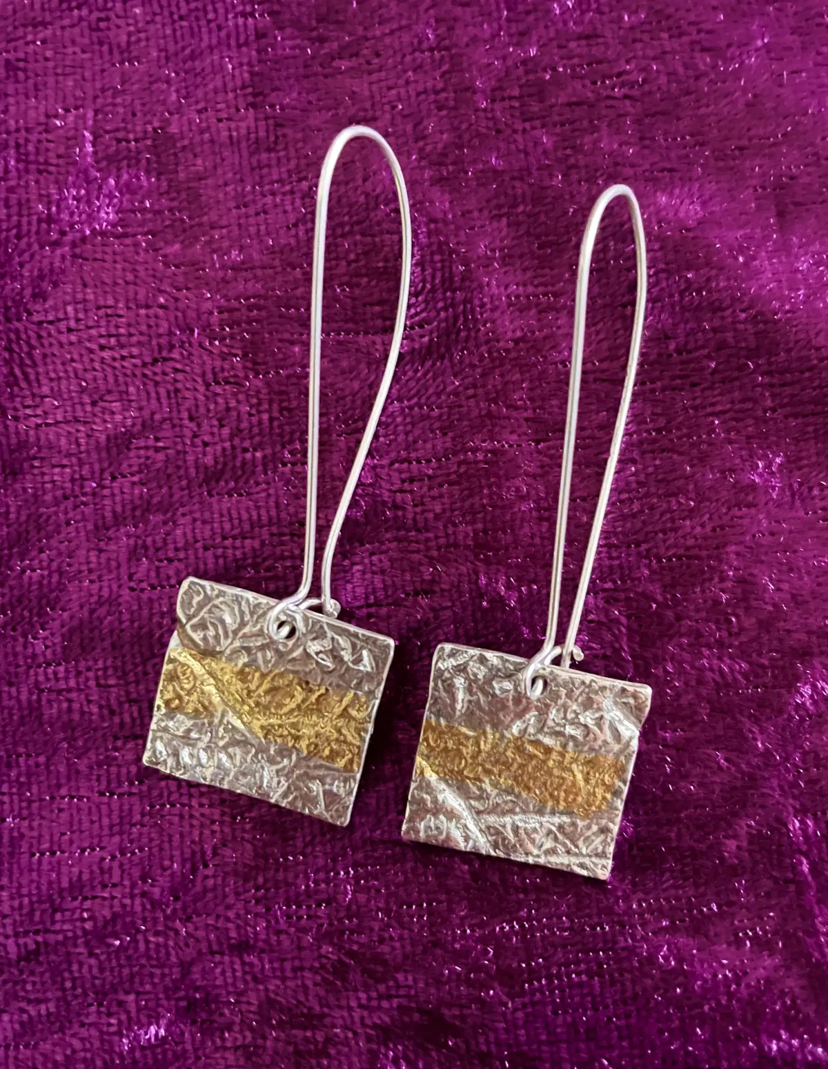 Silver and gold earrings