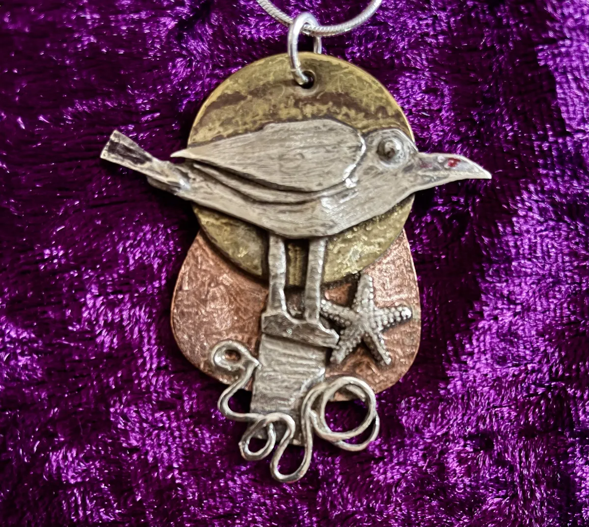 Silver seabird pendant