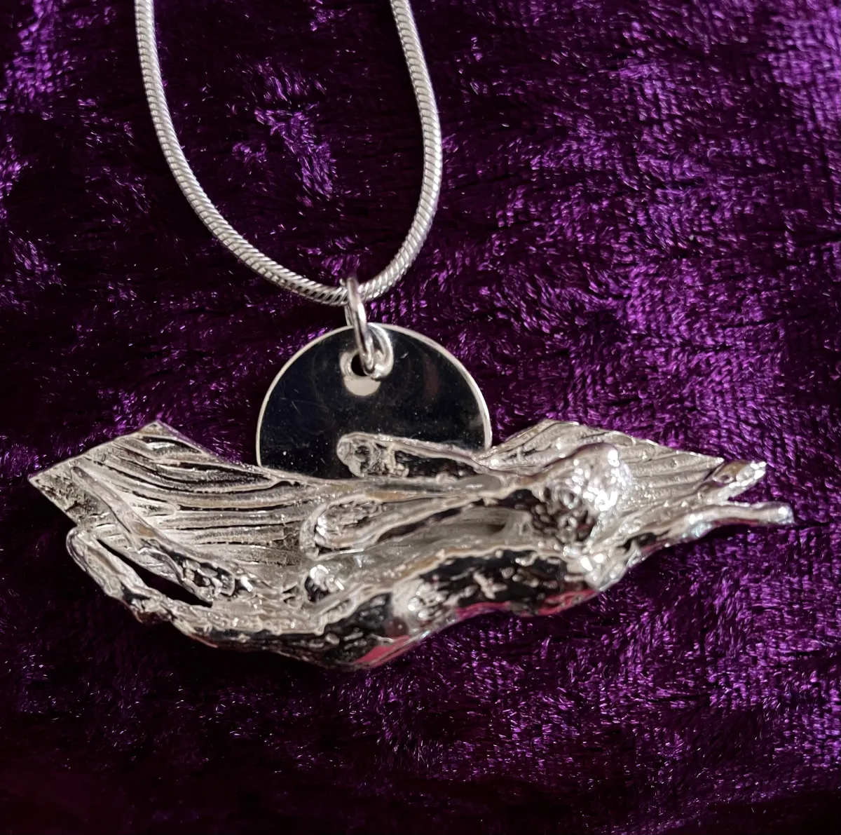 Solid silver leaping hare pendant