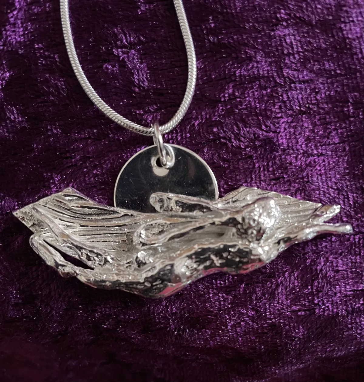 Solid silver leaping hare pendant
