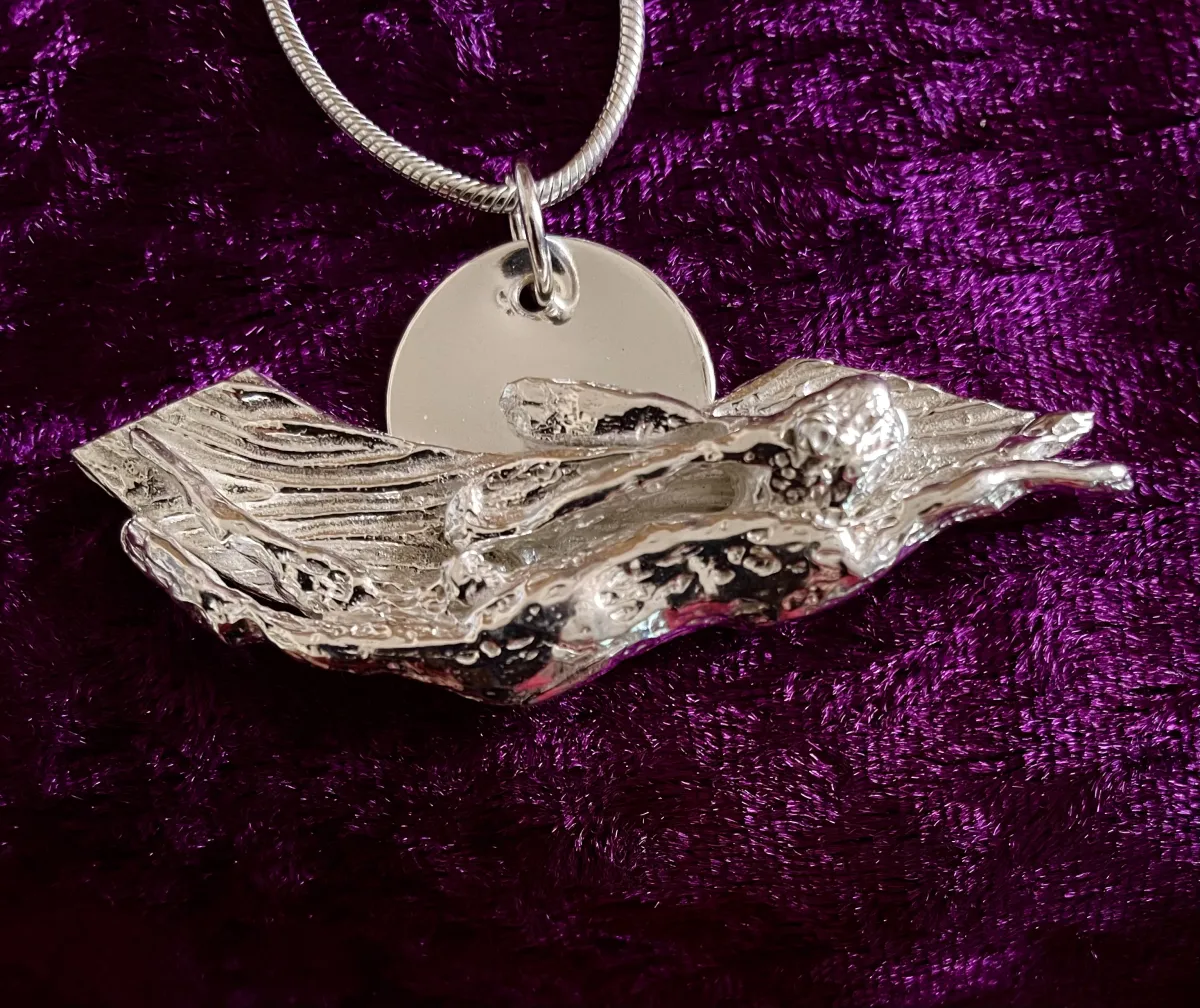 Solid silver leaping hare pendant