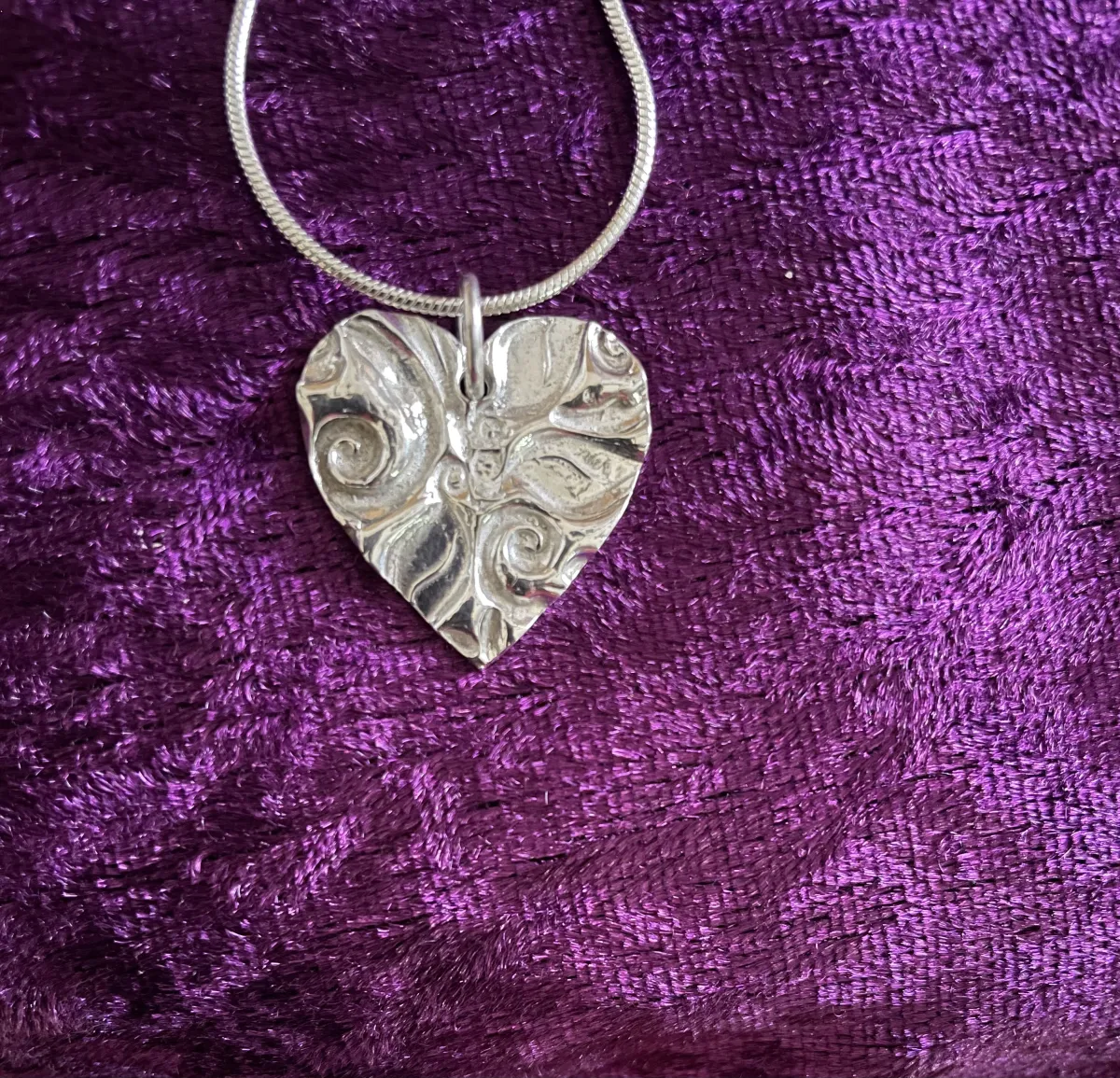 Textured silver heart pendant