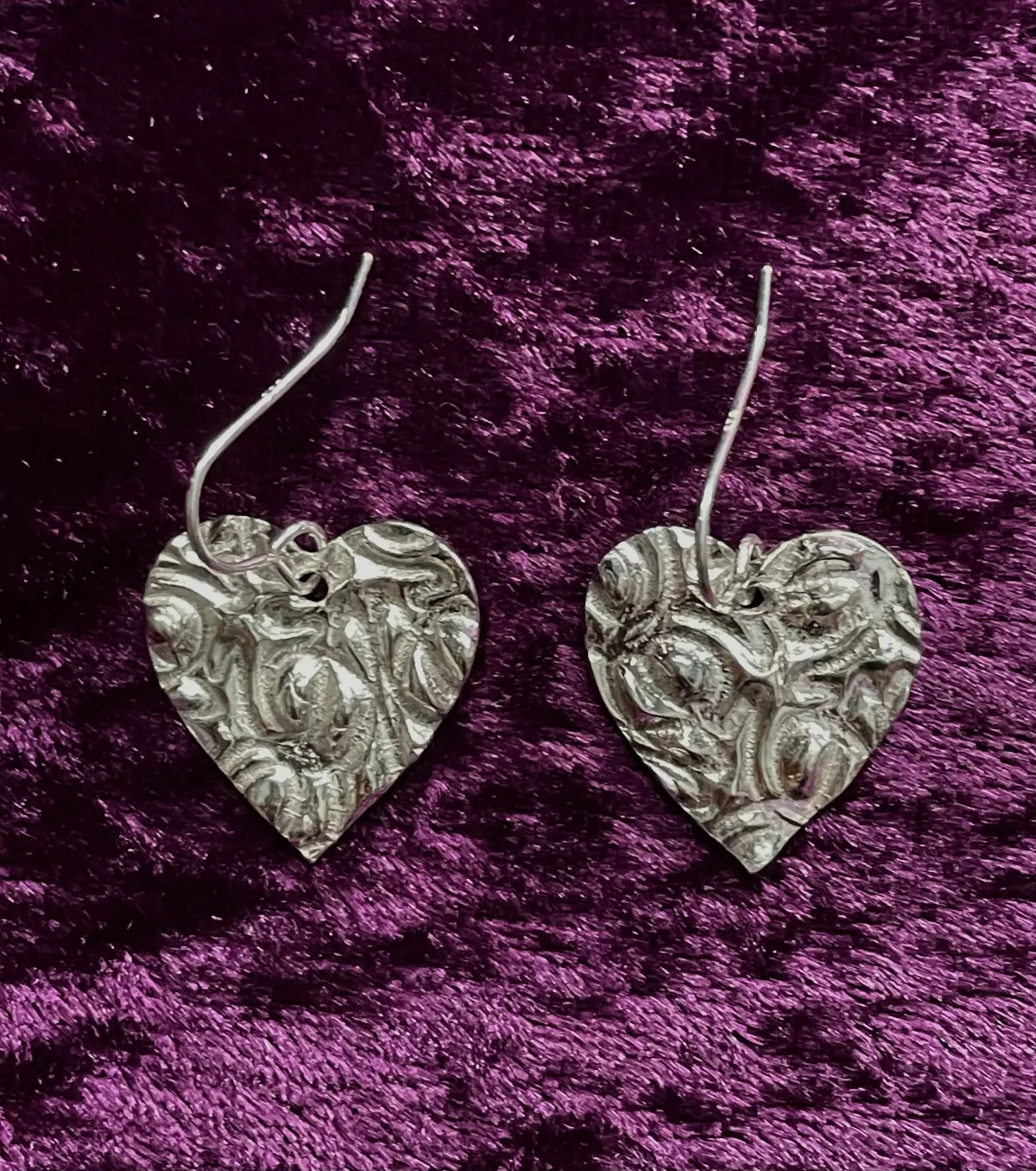 Textured silver heart shaped earrings