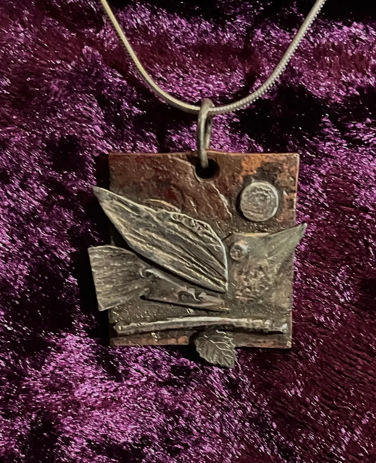 Silver bird pendant