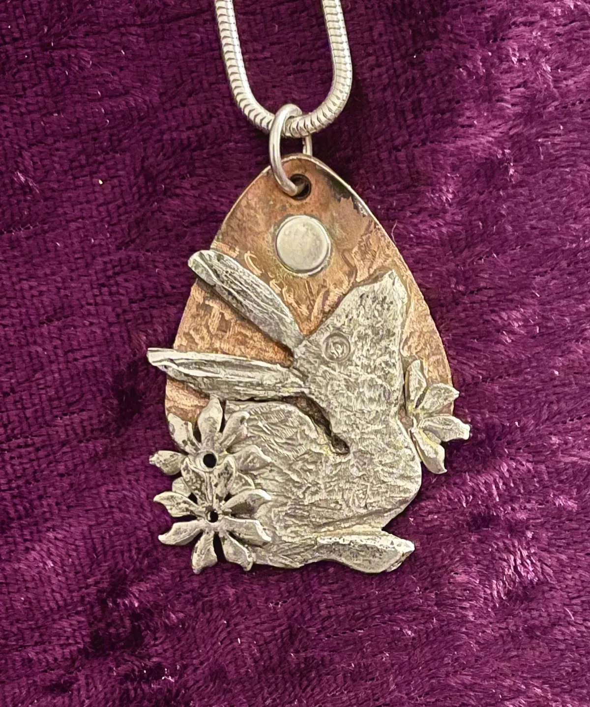 Textured silver hare on copper