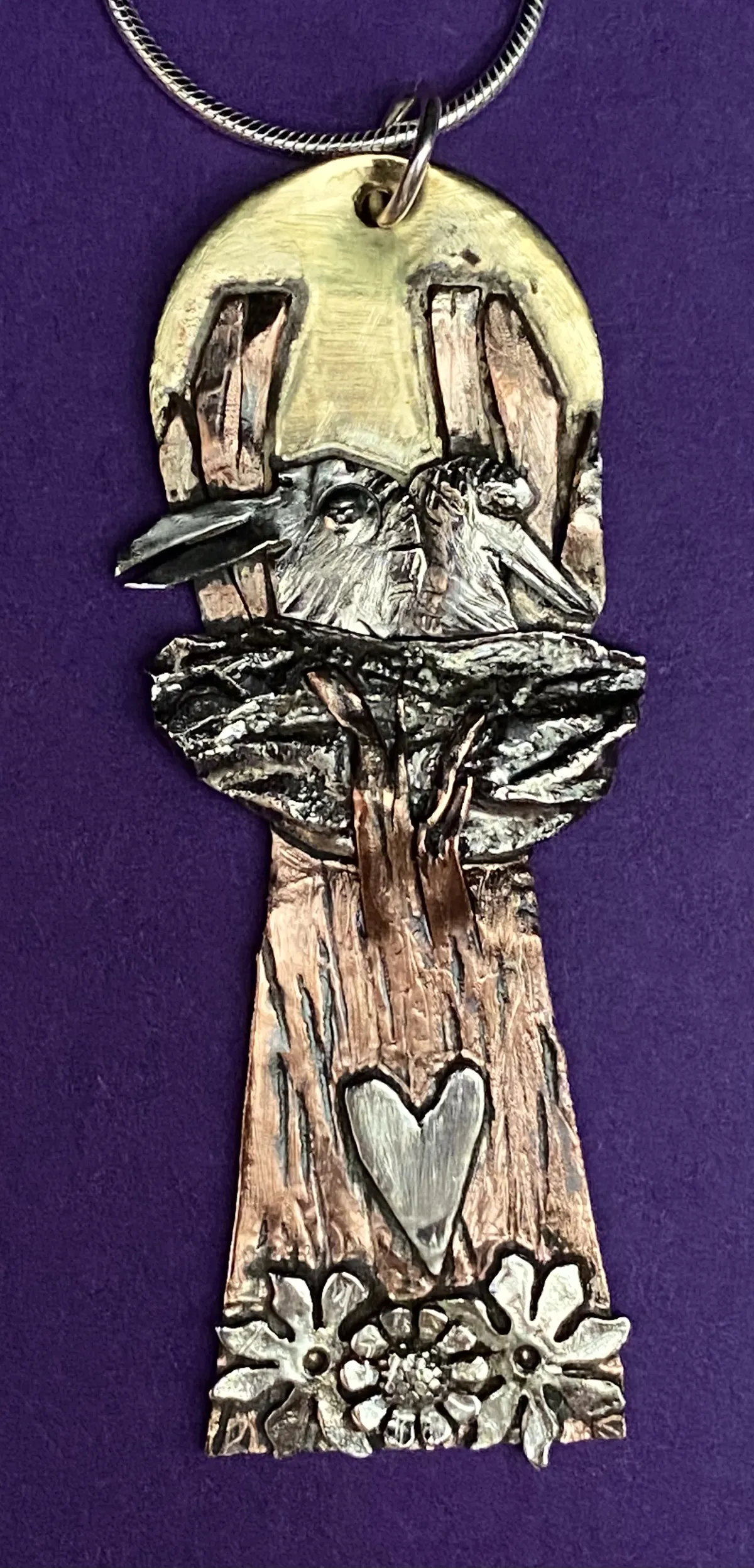 Birds in the nest pendant
