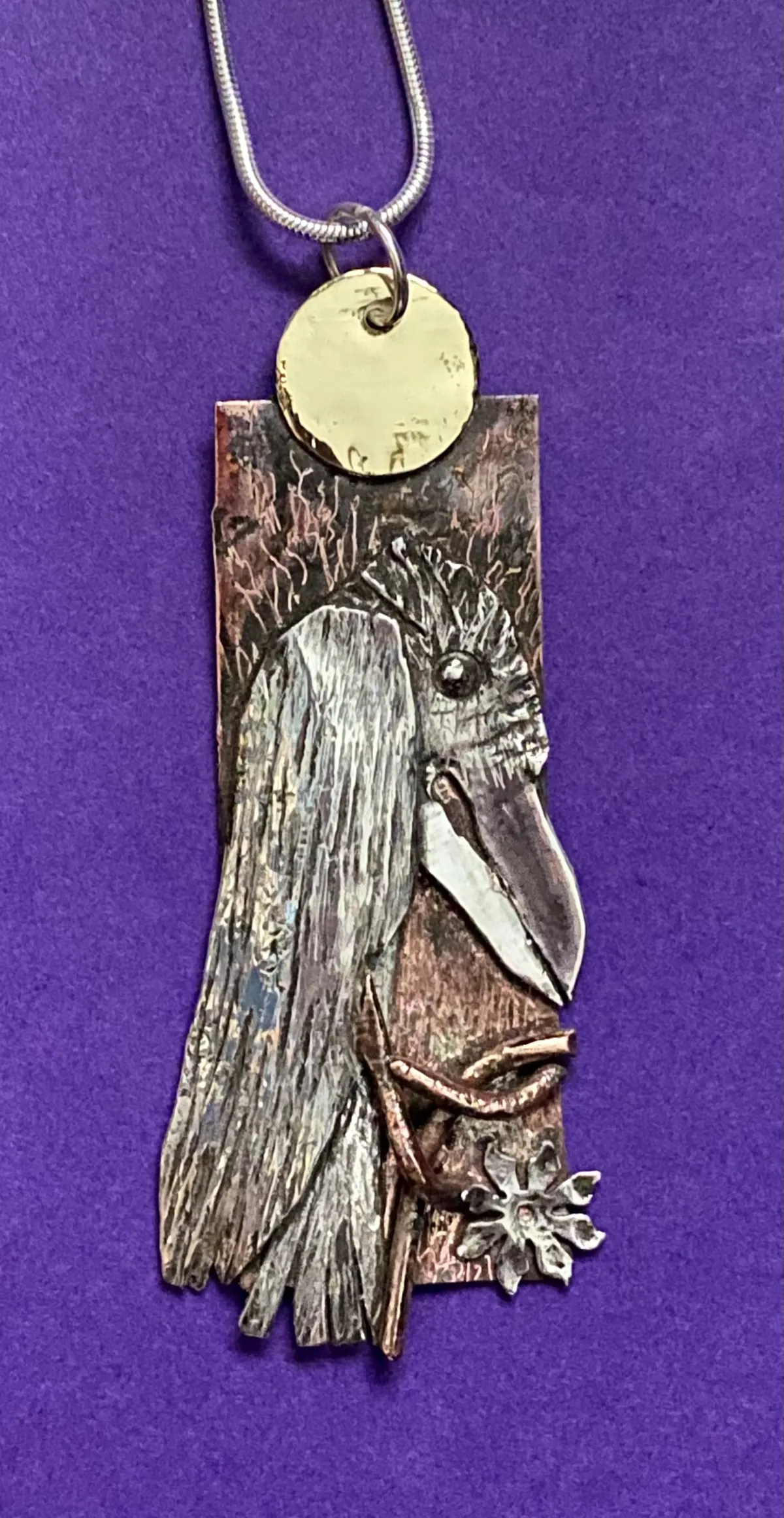 Textured silver raven