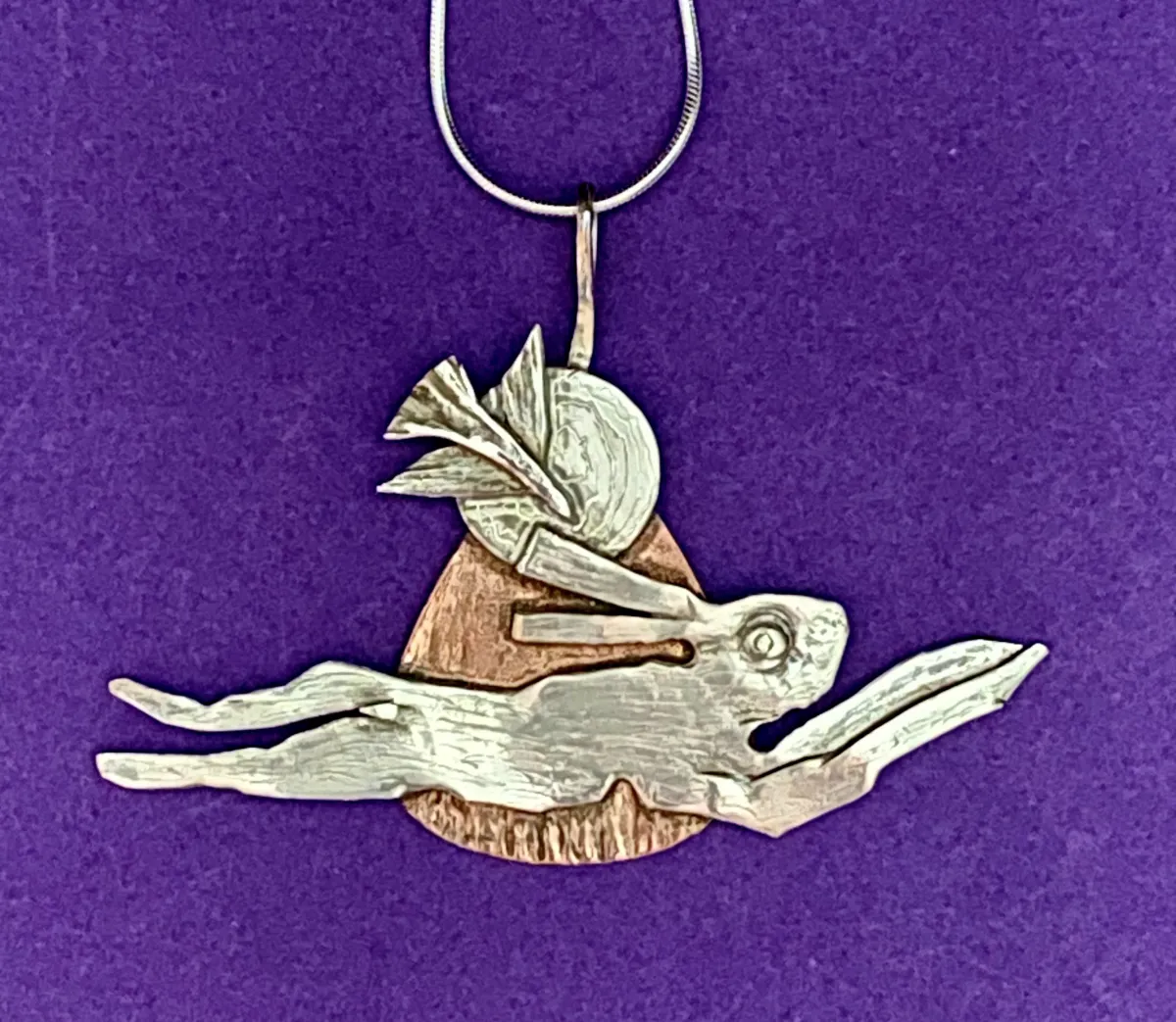 Large silver hare in full flight
