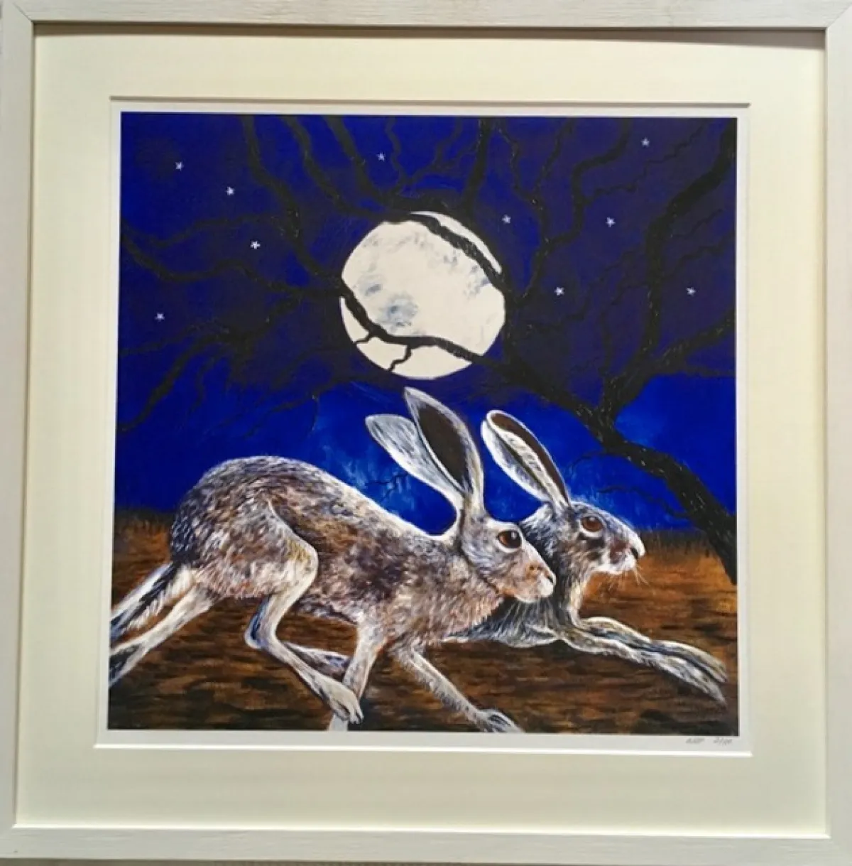 Running Hares Framed Print